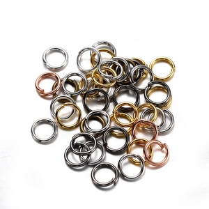Macro shot of assorted multi-color metal jump rings for DIY jewelry making