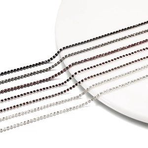Close-up of colorful rhinestone claw chains in five vibrant shades for DIY crafts