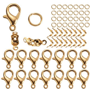 Detailed set of gold lobster clasps, open jump rings and fold-over cord ends for DIY jewelry