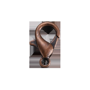 Macro detail of antique copper lobster clasp and rings for DIY jewelry making