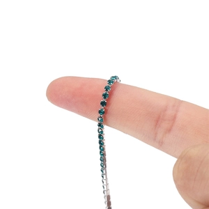 Delicate 2mm silver-plated claw chain featuring vibrant turquoise round rhinestones