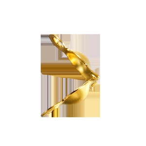 Detailed macro view of gold-plated metal clamshell bead tips for DIY jewelry making