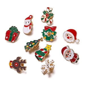 Detailed view of 10 piece Christmas enamel pin set with reindeer snowman and trees