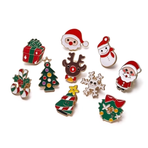 Close-up of 10 colorful enamel Christmas brooches with reindeer and snowman designs