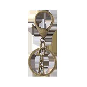 Gros plan du fermoir mousqueton en bronze avec anneau plat pour porte-clés DIY créatif