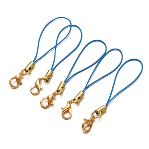 Detail view of blue braided lanyards with gold-plated lobster clasps for DIY accessories