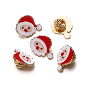 Detail of Santa Claus enamel brooch showing front finish and butterfly clasp back
