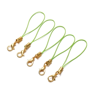 Macro view of five light green braided lanyards with gold-plated lobster clasps