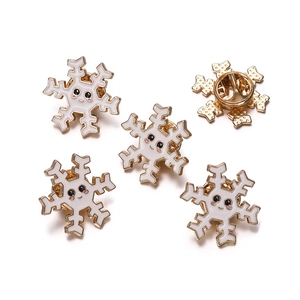Set of five cartoon snowflake enamel brooches with cute expressions and butterfly clasp back