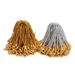 Close-up of gold and silver lobster clasp lanyards for DIY handmade accessory making