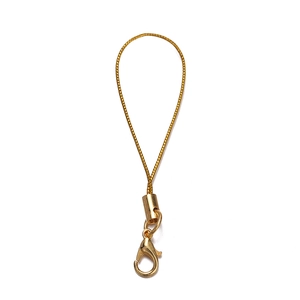 Detail of gold lobster clasp and braided strap for DIY mobile phone accessories