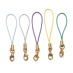Close-up of colorful DIY phone lanyards with golden lobster clasps and metal caps