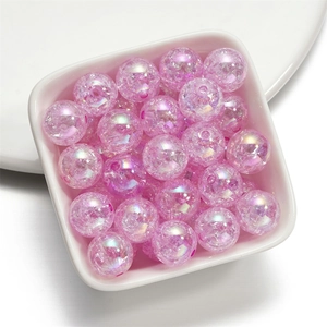 Detail shot of 16mm pink iridescent acrylic cracked beads for DIY jewelry making