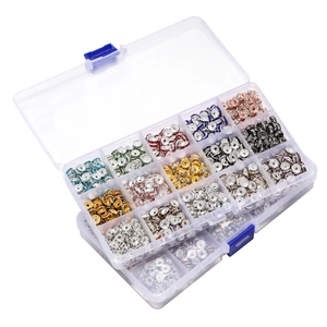 Close-up of 15-grid organizer box filled with colorful rhinestone rondelle spacer beads