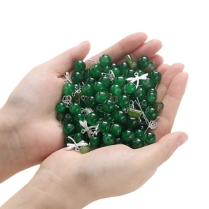 DIY jewelry kit with green crystal beads and dragonfly metal charms for necklace making