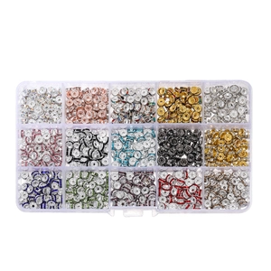 Flat lay of 15-compartment storage box with colorful rhinestone rondelle spacer beads