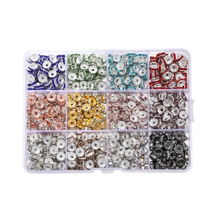 Detailed overhead view of 12-compartment box with colorful rhinestone rondelle spacer beads