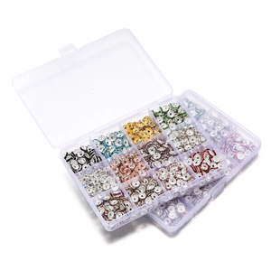 Detail view of 15-grid organizer box filled with colorful rhinestone spacer beads for DIY jewelry