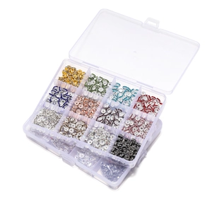 Close-up of 15-grid organizer box filled with colorful rhinestone rondelle spacer beads