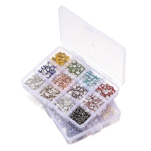 Top view of 15-compartment organizer with colorful rhinestone spacers for DIY jewelry
