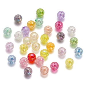 Detailed macro view of 16mm colorful acrylic cracked beads with pre-drilled holes
