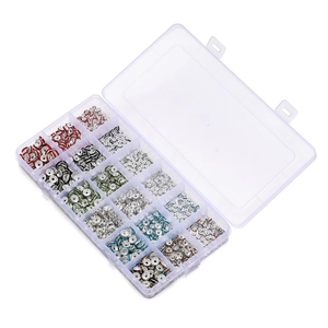 Detailed overhead view of 15-grid organizer box with colorful rhinestone spacer beads