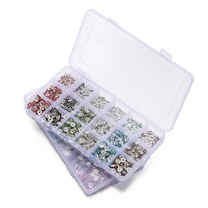 Detail of 15-grid organizer box filled with assorted colorful rhinestone rondelle spacer beads