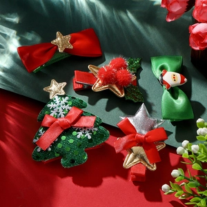 Detailed set of 5 Christmas hair clips with sequins, ribbons, and Santa figurines