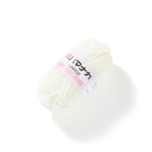 Detailed macro view of white Liliarge 4-ply milk cotton yarn with a soft texture