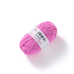 Detail of rose pink 4-ply milk cotton yarn with LILIARGE label for crochet doll knitting