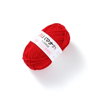 Top view of red 4-ply cotton yarn roll with Hamanaka label for crochet knitting