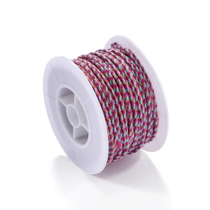 Macro detail of multi-color braided cotton cord roll for DIY jewelry making and crafts