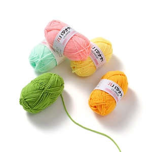Five assorted colors of soft milk cotton yarn rolls for DIY crochet and hand knitting