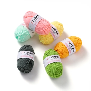 Assorted colorful 4-ply milk cotton yarn rolls for DIY crochet doll knitting projects