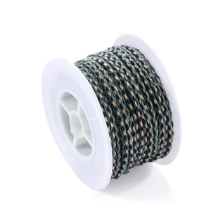 Macro view of three-color woven braided cord roll for DIY jewelry making and crafts