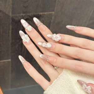 Pink gradient long almond press-on nails with 3D white flowers, pearls and rhinestones