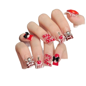 Handmade red and black punk press-on nails with 3D bows and cherry patterns
