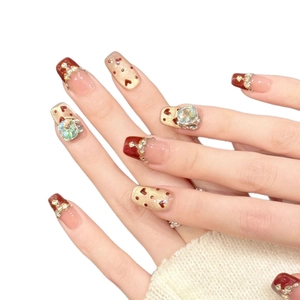 Handmade burgundy heart press-on nails with luxury rhinestones and glitter French tip