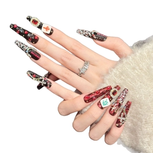 Extra long coffin press-on nails in red and black with mahjong charms and crystals