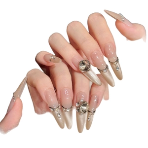 Handmade nude gradient press-on nails with luxury crystals, pearls and cat-eye finish