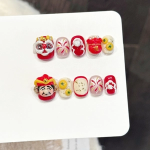 3D Chinese New Year press-on nails featuring lion dance, God of Wealth and red lucky bags