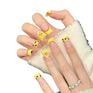 Long square yellow French press-on nails with 3D flower, leopard print and bead accents