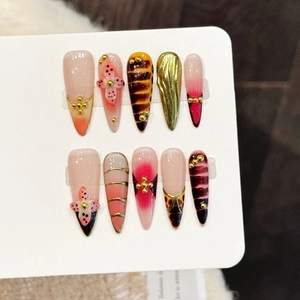 Handmade tortoiseshell press-on nails with golden textures and 3D vintage floral patterns