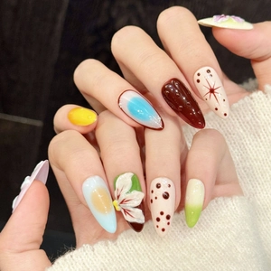 Floral hand-painted stiletto press-on nails with 3D embossed flowers and polka dots