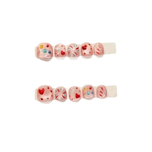 Cartoon hand-painted pink press-on toenails with heart and firework patterns for kids