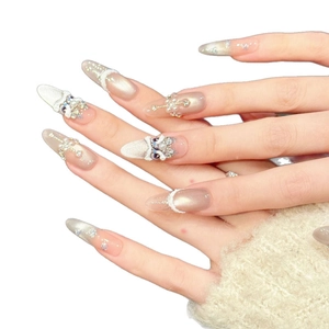 Ice crystal fox press-on nails with 3D lion dance charms and cat eye effect on almond shape