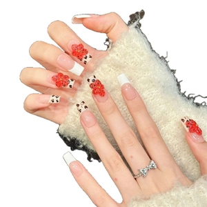 Handmade press-on nails with 3D red flowers and leopard print in French tip style