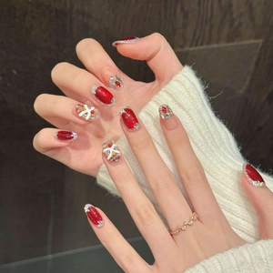 Handgefertigte rote Cat-Eye Kunstnägel mit 3D-Löwentanz-Motiven und Schleifen-Dekor