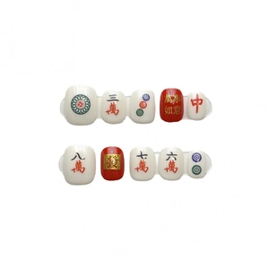 Handmade Chinese Mahjong themed press-on nails with red characters and gold foil finish