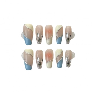 Handmade soft blue and cream press-on nails with silver glitter and rhinestone accents